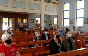 Пластуни Станиці Квінсленд передали символічний Вогонь провідникам УГКЦ і УПЦ